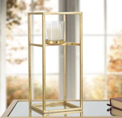 Bougeoir en métal doré et verre transparent carré