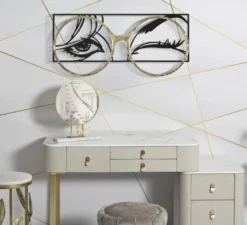 Décoration murale métal noir visage lunettes métal doré