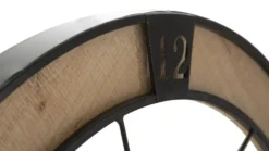 Horloge murale ronde en bois et fer avec visages stylisés
