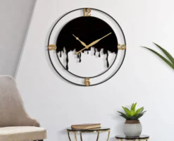 Horloge murale ronde Splash Fer Noir et finitions dorées