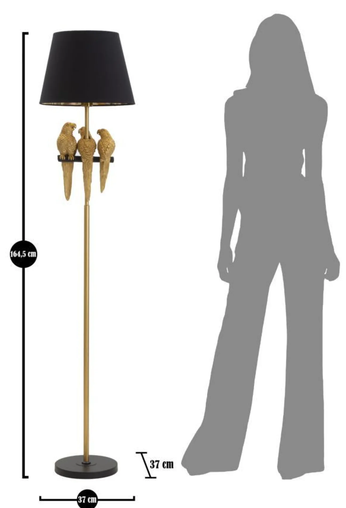 Lampe de sol dorée avec abat-jour en tissu noir et décor perroquets