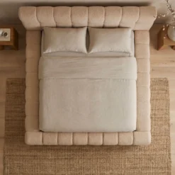 Lit-coffre avec rebords matelassés Challow 140x190cm Tissu Bouclette Beige