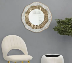 Miroir mural en métal doré et clair