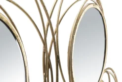Panneau en métal doré avec cercles et miroirs