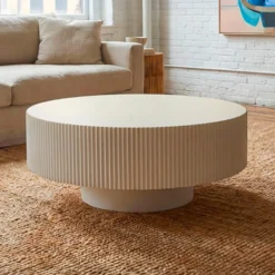 Table ronde L78,5cm avec rainures verticales sculptées Pulsar Blanc cassé