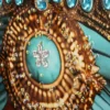 Toile laquée Maya visage exotique turquoise avec cadre